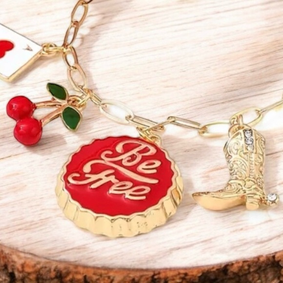 Gold toned dainty and fun Charm Necklace cherries, heart, boot and crystals - Picture 10 of 17